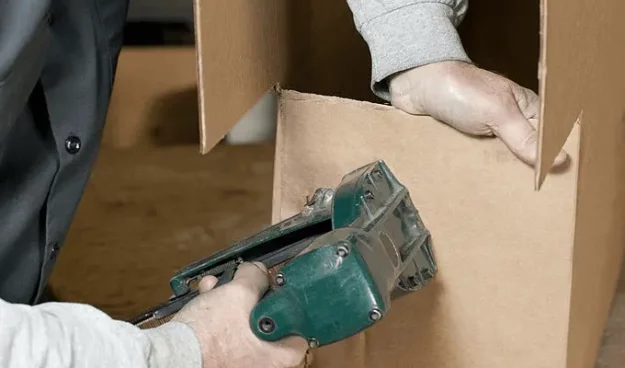 Packing with staple gun.png e1675752918928
